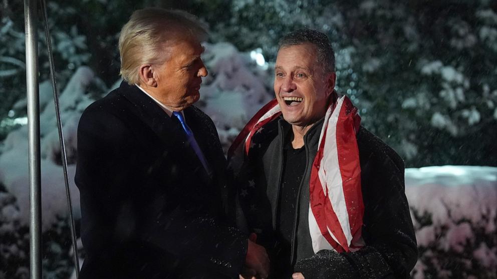 PHOTO: President Donald Trump greets Marc Fogel at on the South Lawn at the White House, Feb. 11, 2025, in Washington. 