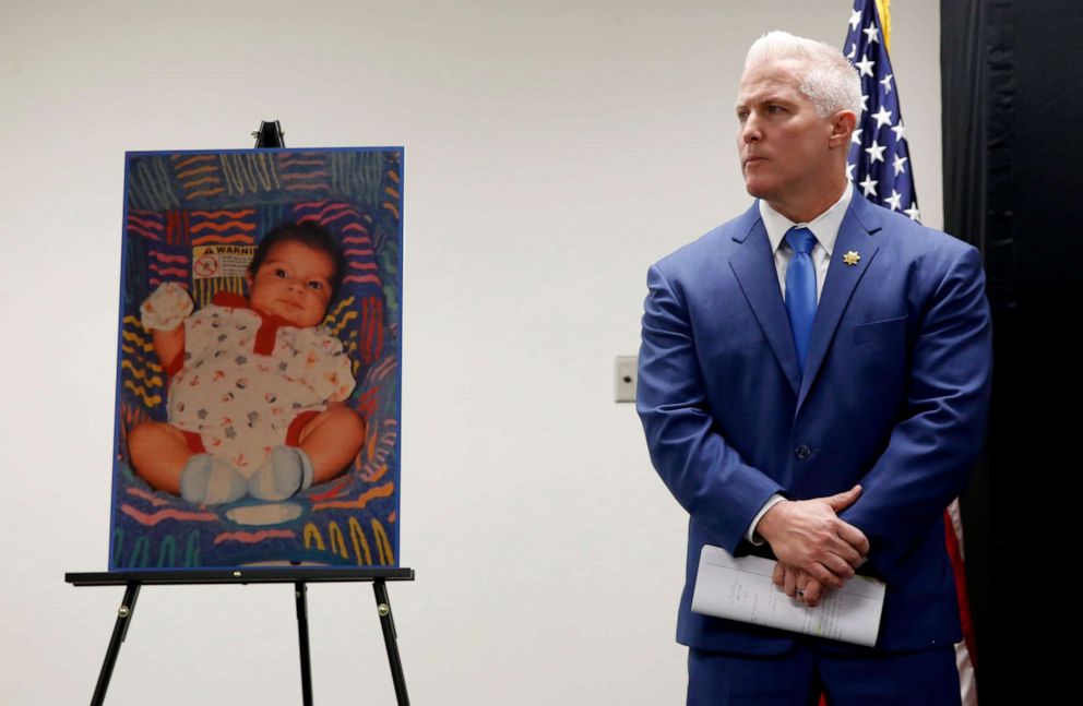 PHOTO: Yolo County District Attorney Jeff Reisig stands next to a photo of Kato Krow Perez, born in 2001, one of five infants believed to be killed by their father, during a news conference in Woodland, Calif., Jan. 27, 2020.