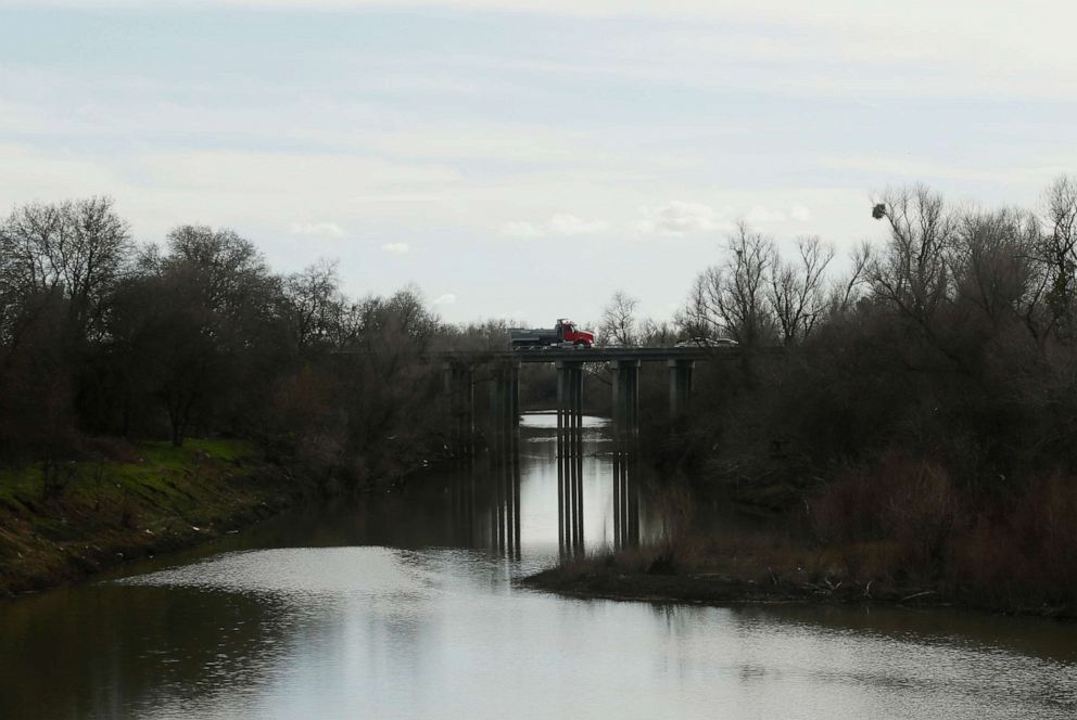 PHOTO: Vehicles cross a bridge, over the irrigation slough where the body of an infant, Nikko Lee Perez, was discovered in Yolo County in 2007, near Woodland, Calif., Jan. 27, 2020. 