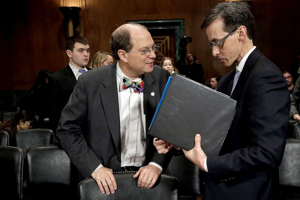 PHOTO: Paul Rosenzweig talks with Richard Salgado before the Senate Judiciary Committee's Privacy, Technology, and the Law Subcommittee, Nov. 13, 2013, in Washington.