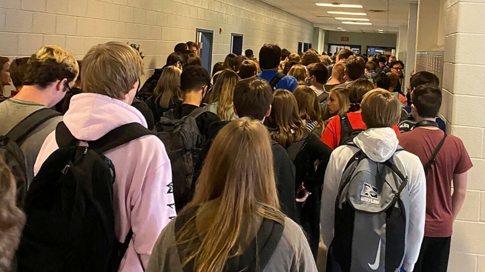 PHOTO: Students crowd a hallway, Aug. 4, 2020, at North Paulding High School in Dallas, Ga.