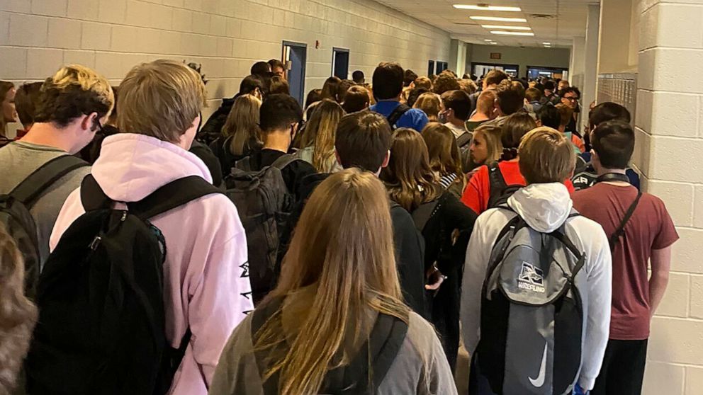 PHOTO: Students crowd a hallway, Aug. 4, 2020, at North Paulding High School in Dallas, Ga.