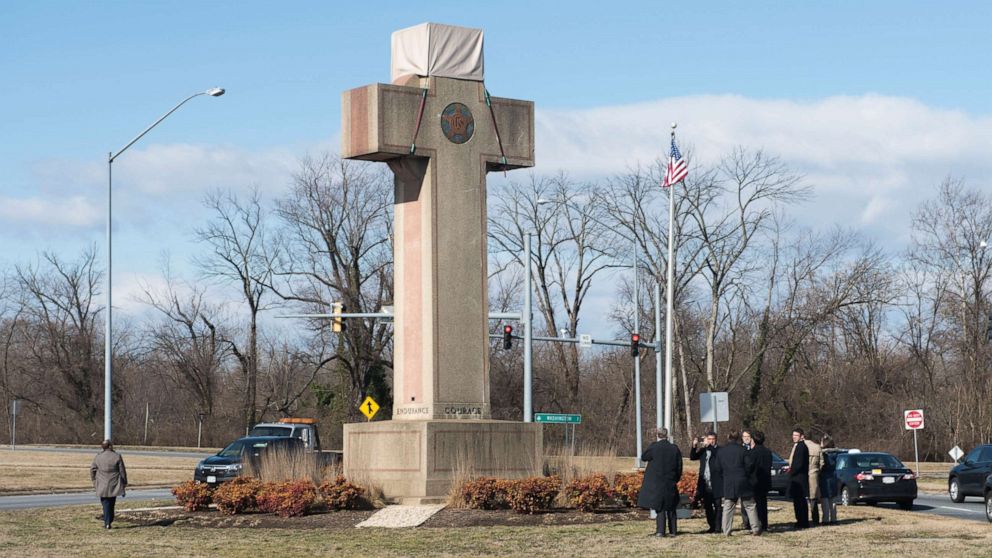PHOTO: In this file photo from Feb. 13, 2019, visitors walk around the 40-foot Maryland Peace Cross dedicated to World War I soldiers in Bladensburg, Md.