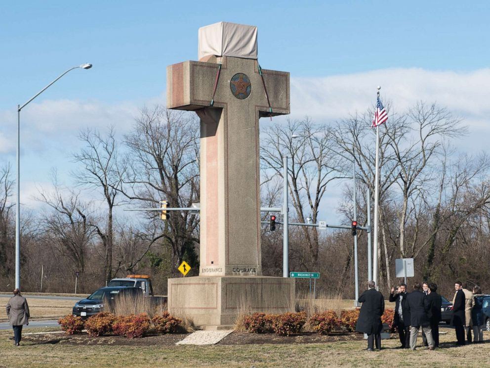 PHOTO: In this file photo from Feb. 13, 2019, visitors walk around the 40-foot Maryland Peace Cross dedicated to World War I soldiers in Bladensburg, Md.