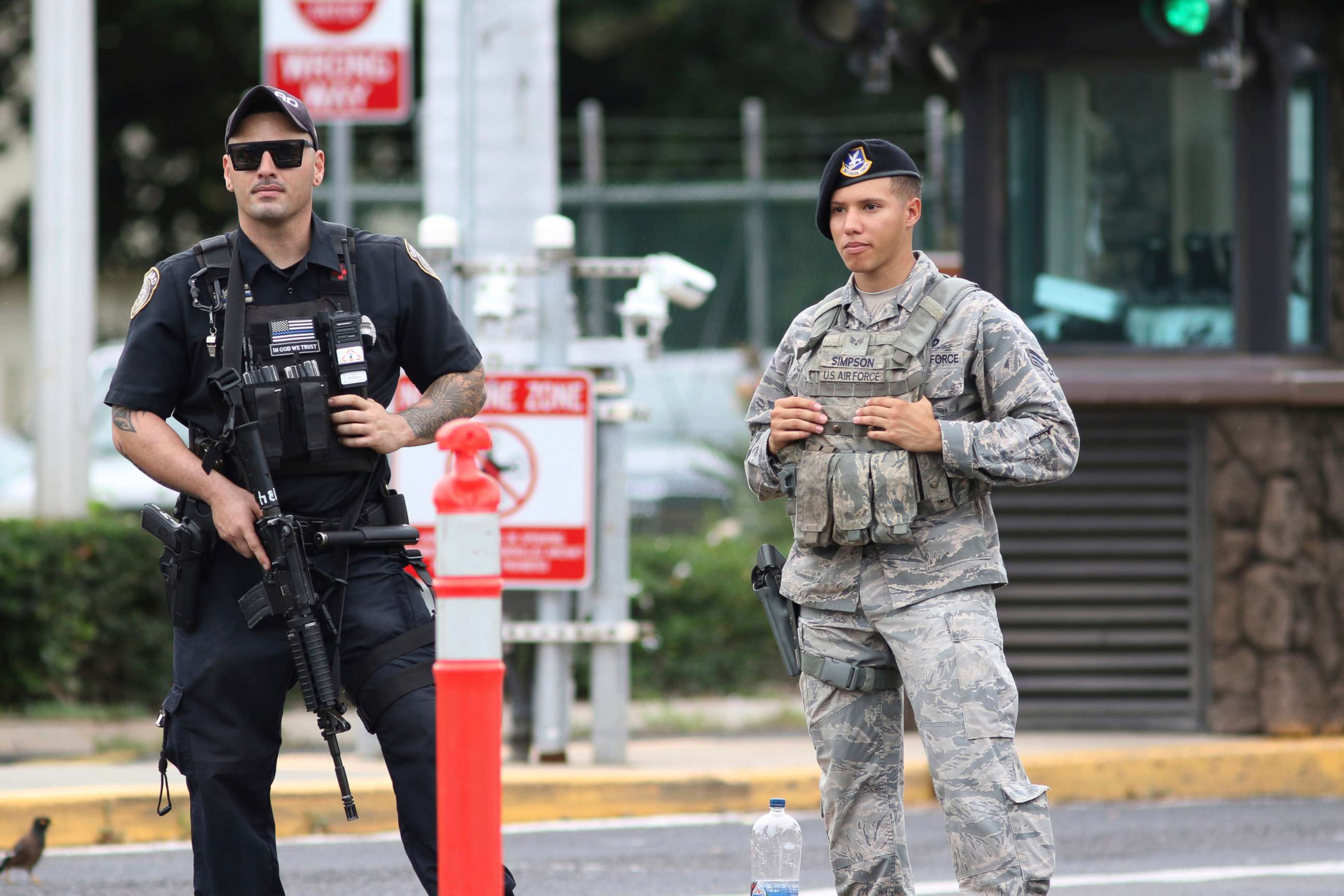 PHOTO: Security stands guard outside the main gate at Joint Base Pearl Harbor-Hickam, in Hawaii, Wednesday, Dec. 4, 2019.