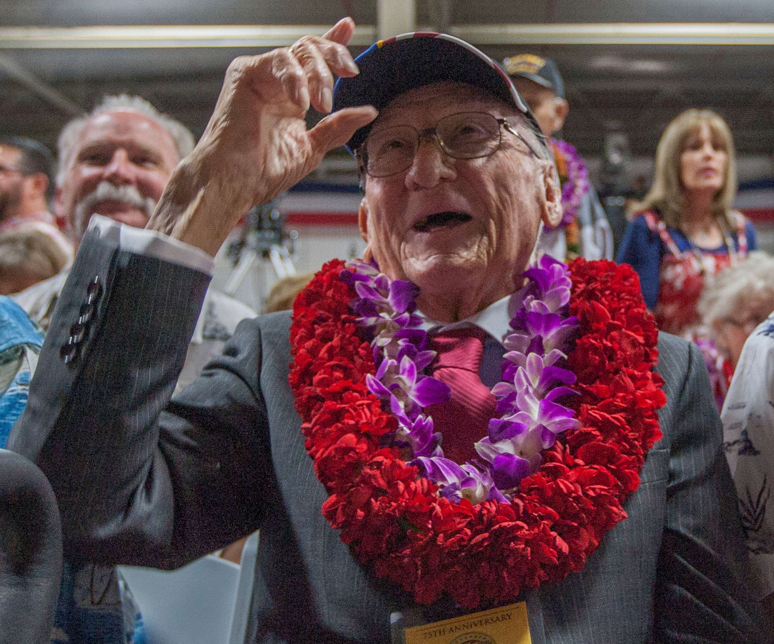 PHOTO: In this file photo taken on Dec. 7, 2016, USS Arizona survivor Donald Stratton, center, acknowledges a friend at Kilo Pier next to the World War II Valor in the Pacific National Monument at Joint Base Pearl Harbor-Hickam in Honolulu, Hawaii.