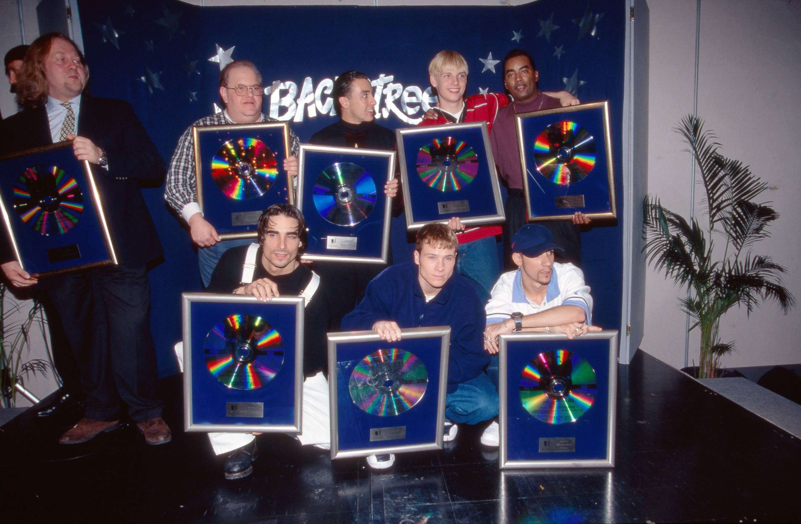PHOTO: Lou Pearlman is shown with boy group "Backstreet Boys", in Munich, 1996.