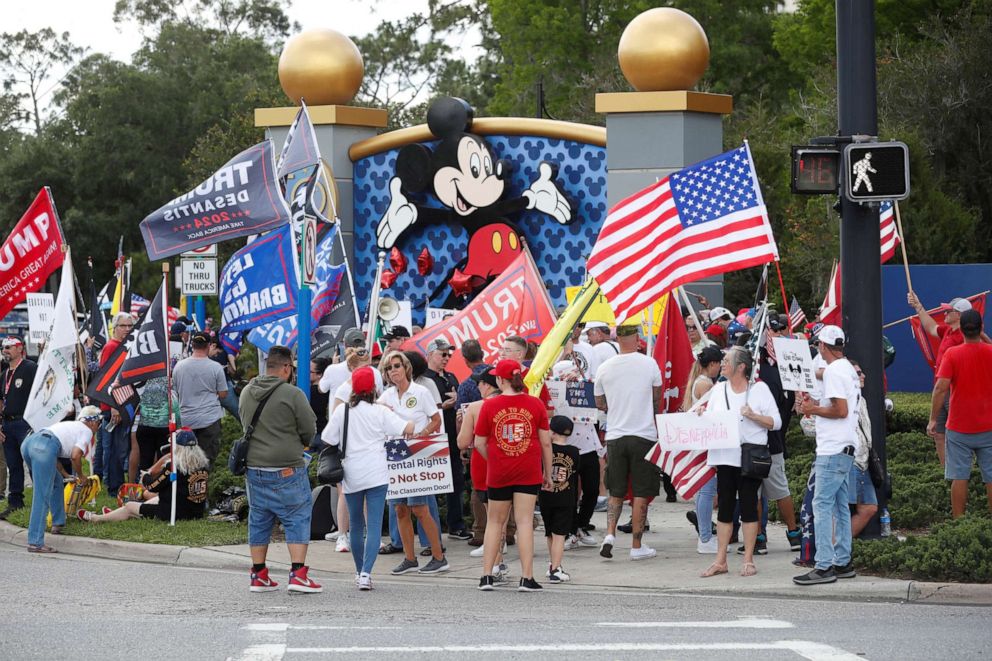 PHOTO: Supporters of Florida's Republican-backed "Don't Say Gay" bill that bans classroom instruction on sexual orientation and gender identity for many young students gather for a rally outside Walt Disney World in Orlando, Fla., April 16, 2022. 