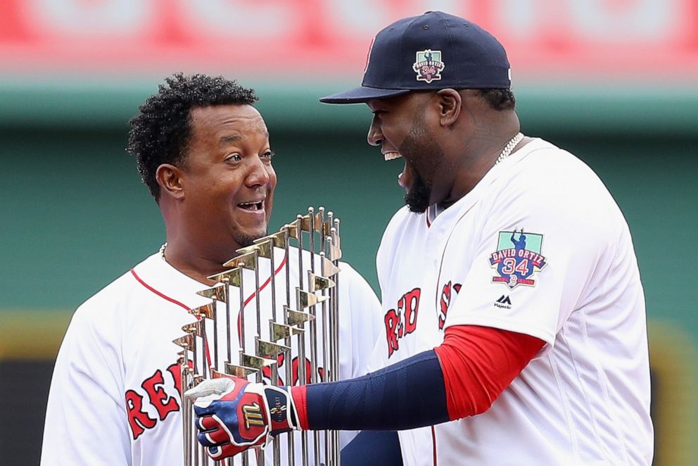 PHOTO: Boston Red Soxs Pedro Martinez and David Ortiz laugh during the pregame ceremony to honor Ortizs retirement before his last regular season home game at Fenway Park, Oct. 2, 2016 in Boston.