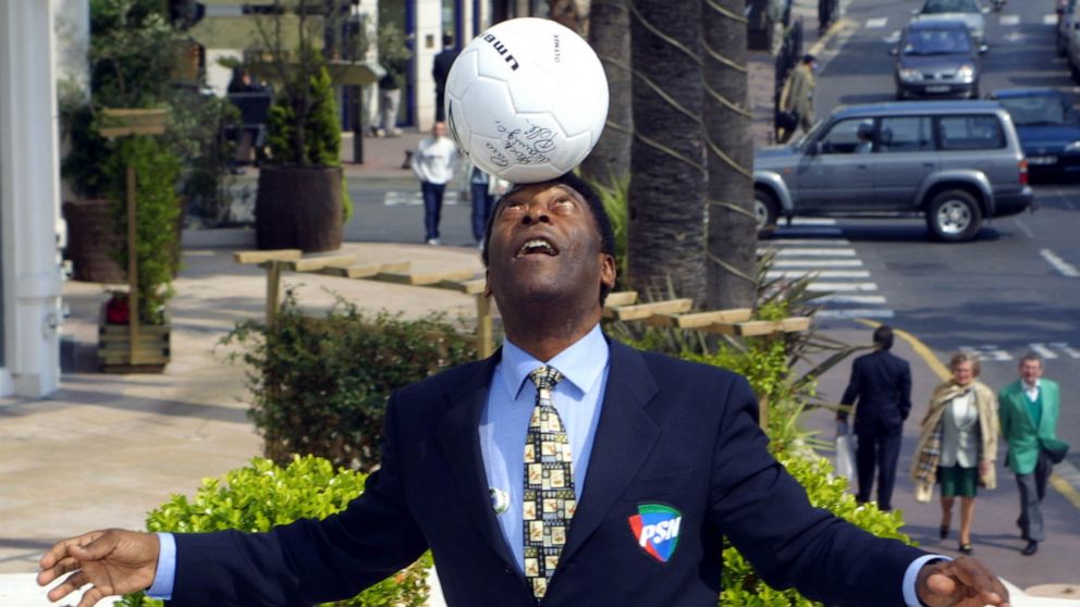 PHOTO: In this April 4, 2001, file photo, Brazilian football legend Pele plays with a soccer ball in Cannes, France.