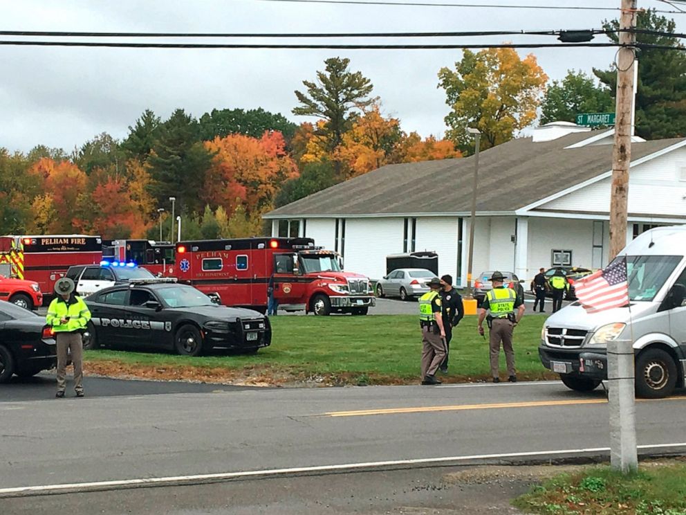 PHOTO: In this photo provided by WMUR-TV, police stand outside the New England Pentecostal Church after reports of a shooting on Oct. 12, 2019, in Pelham, N.H.