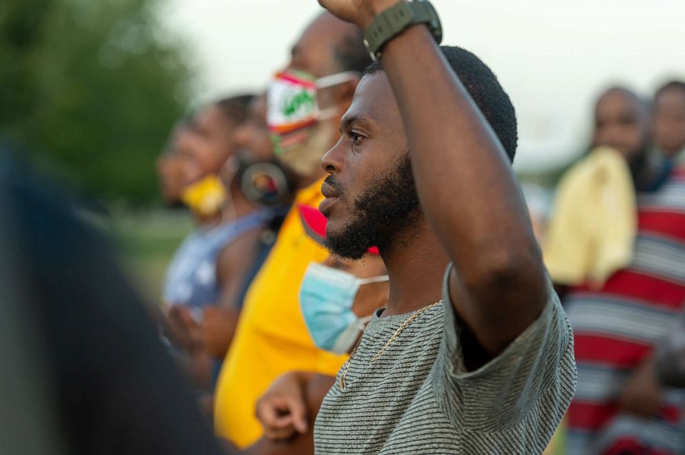 PHOTO: Protesters take to the street and block traffic at the intersection of Willow St and Evangeline Thruway after a vigil held for Trayford Pellerin, 31, who was shot and killed by Lafayette police officers while armed with a knife, Aug. 22, 2020.