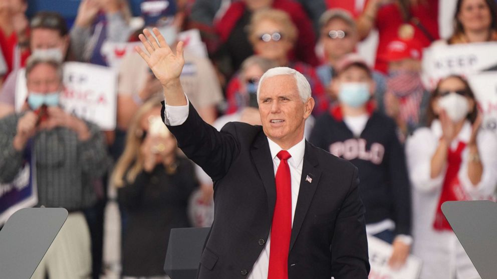 PHOTO: Vice President Mike Pence participates in a campaign rally to support the runoff election of Georgia Republican Senators David Perdue and Kelly Loeffler at Savannah/Hilton Head International Airport in Savannah, Ga., Dec. 4, 2020.