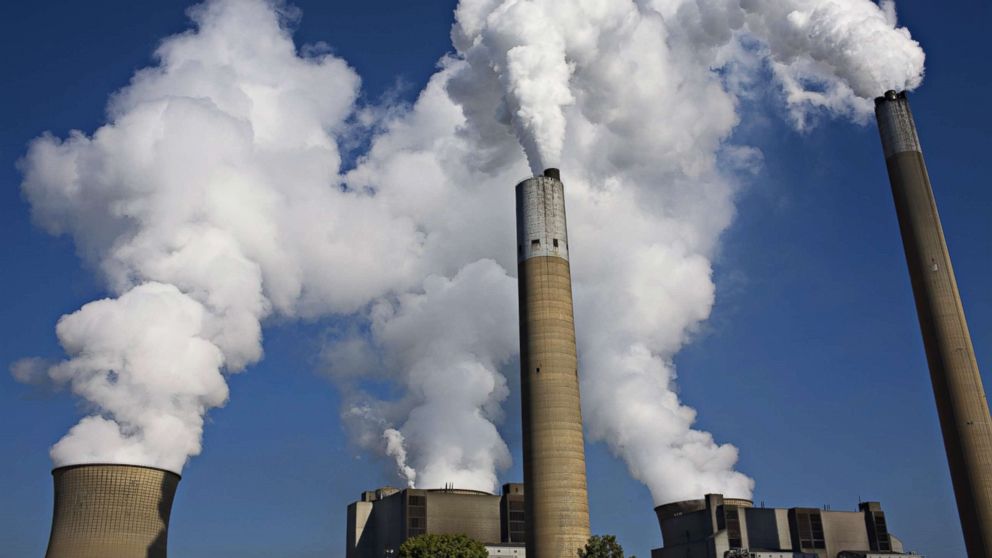 Coal smoke and steam vapor pour out of the Bruce Mansfield Power Plant over a nearby residential area on Sept. 11, 2008 in Shippingport, Pa. 