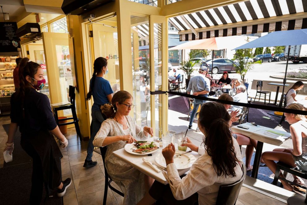 PHOTO: People eat lunch at Meli-Melo Creperie, Juice Bar & Cafe in Greenwich, Connecticut, on June 17, 2020.