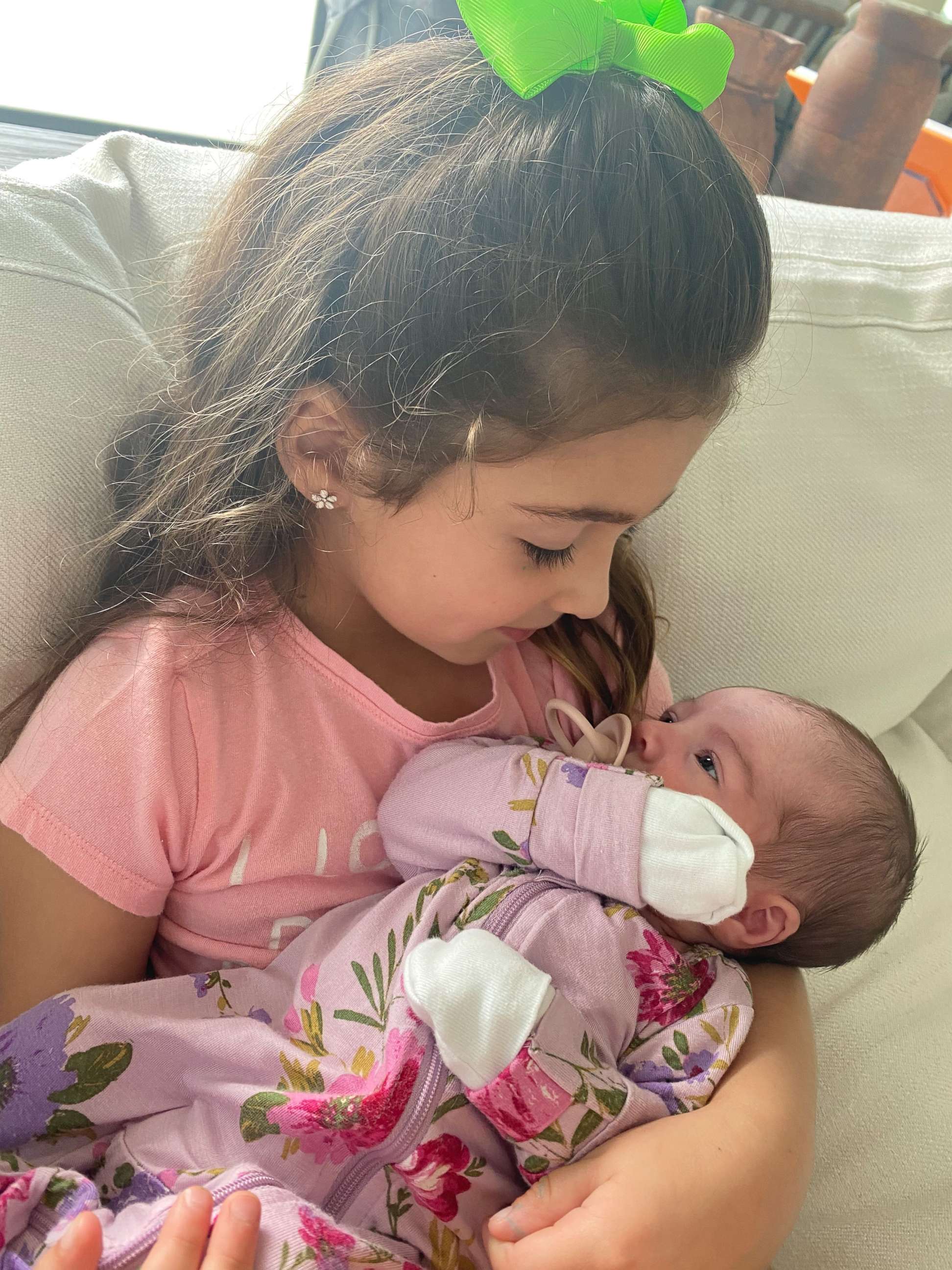 PHOTO: Olivia holds her baby sister Celeste.