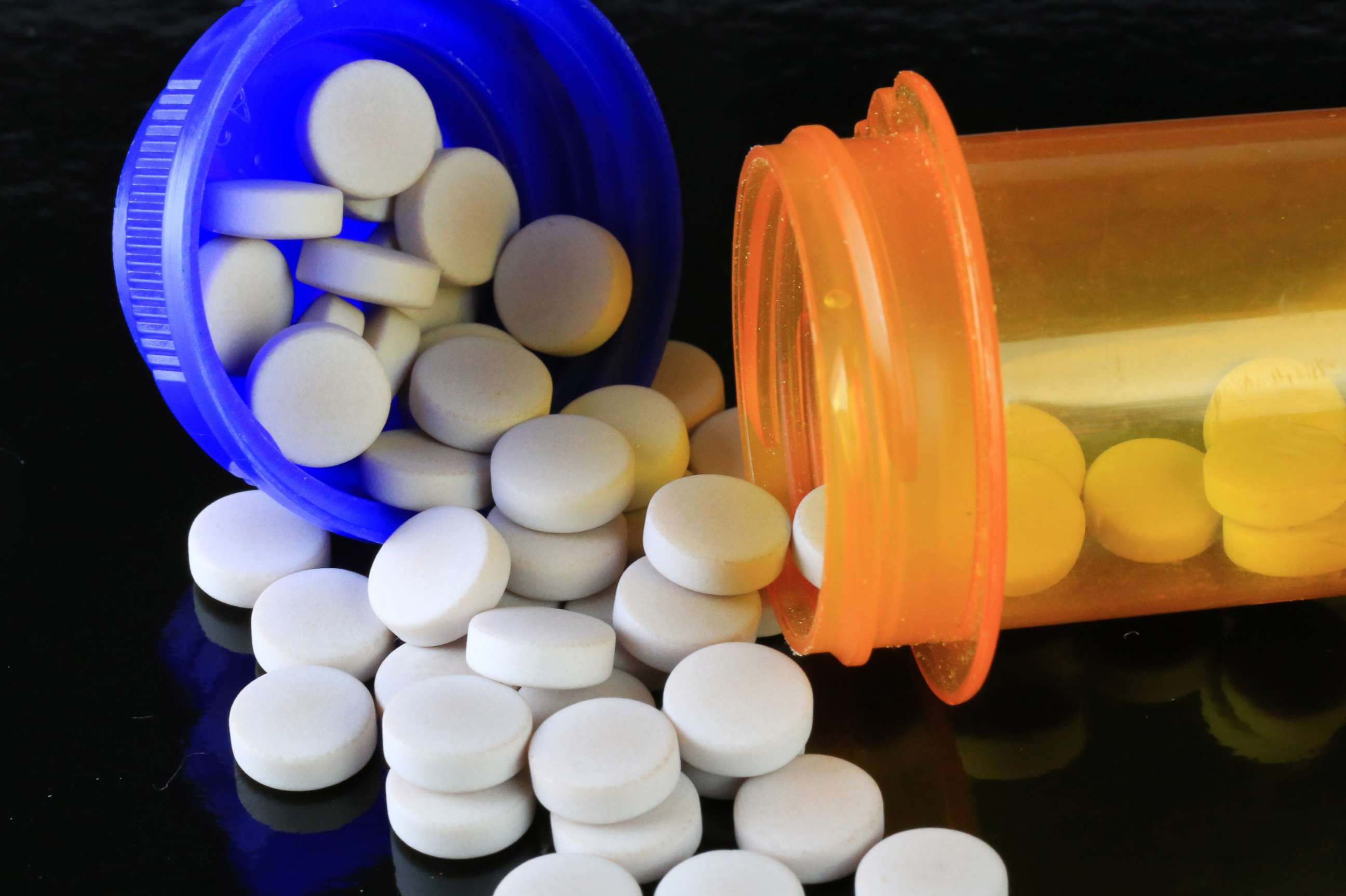 PHOTO: Stock photo of pills and a prescription bottle.