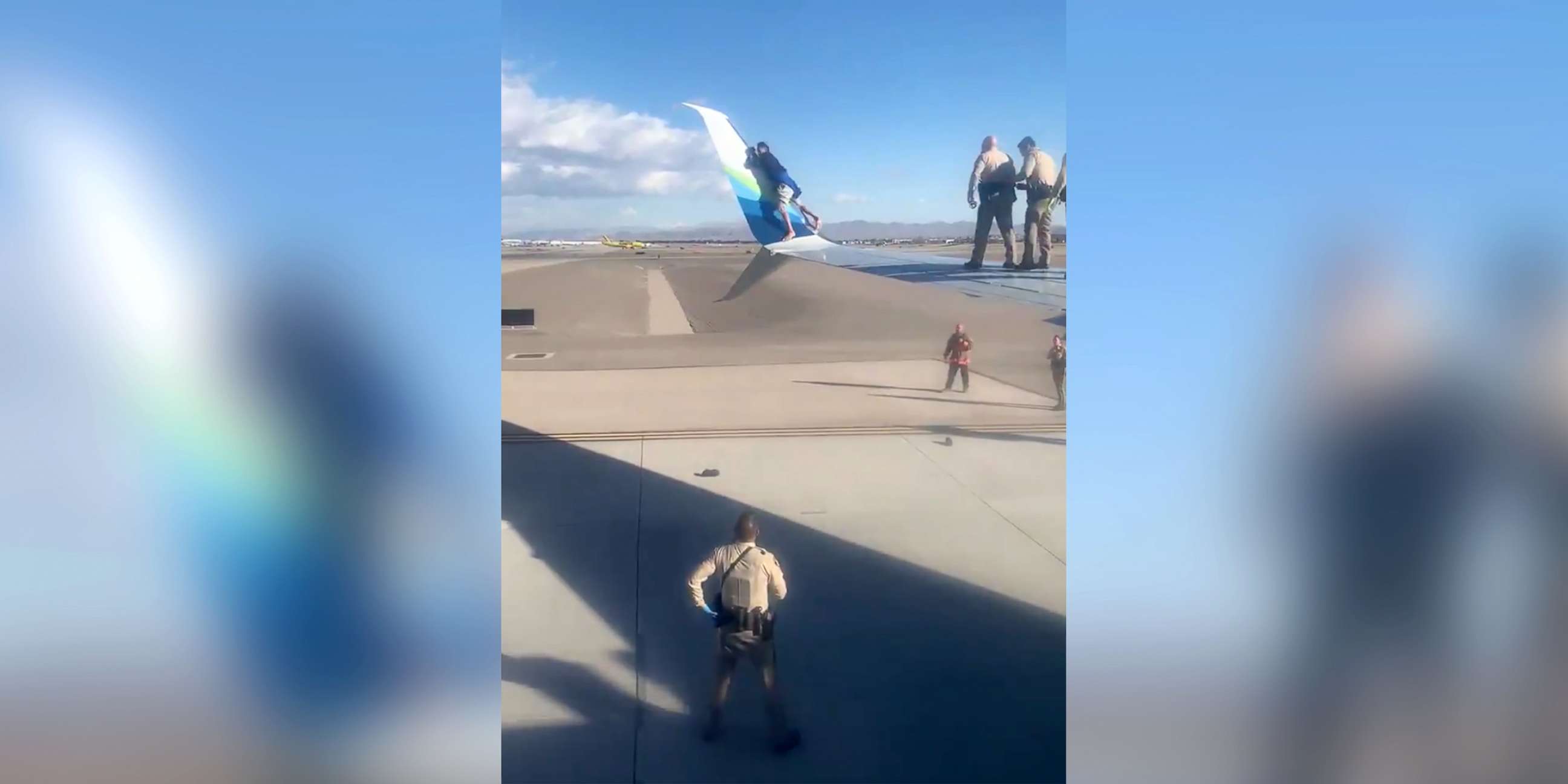 PHOTO: A suspect climbed to the wing of an airplane while it was taxiing prior to takeoff at McCarran Airport in Las Vegas, Dec. 12, 2020.