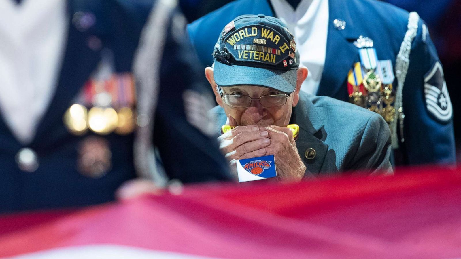 PHOTO: World War II veteran Pete Dupre, 96, plays the national anthem on his harmonica before an NBA basketball game between the New York Knicks and the Cleveland Cavaliers, Nov. 10, 2019, at Madison Square Garden in New York.