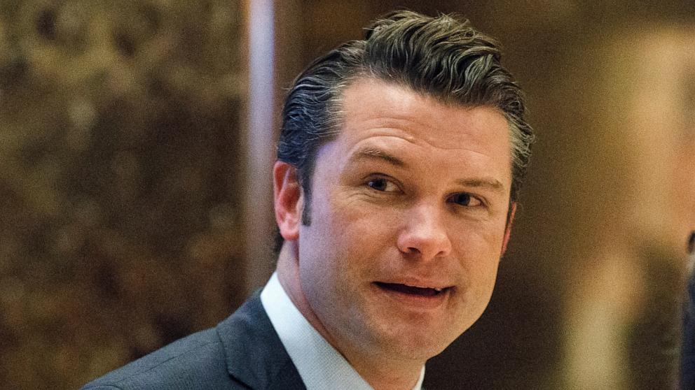 PHOTO: Pete Hegseth walks to an elevator for a meeting with President-elect Donald Trump at Trump Tower in New York City, Dec. 15, 2016. 