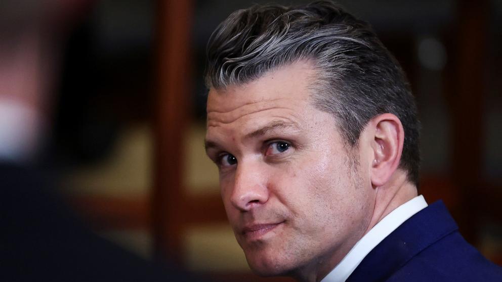 PHOTO: Defense Secretary Pete Hegseth waits for a presentation of the Commander-in-Chief trophy to the U.S. Navy Midshipmen football team of the United States Naval Academy at the White House in Washington, April 15, 2025.