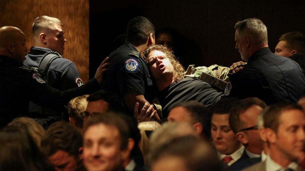 PHOTO: Security personnel remove a protester as Pete Hegseth, President-elect Donald Trump's nominee to be secretary of defense, testifies before a Senate Committee on Armed Services confirmation hearing on Capitol Hill in Washington, Jan. 14, 2025.