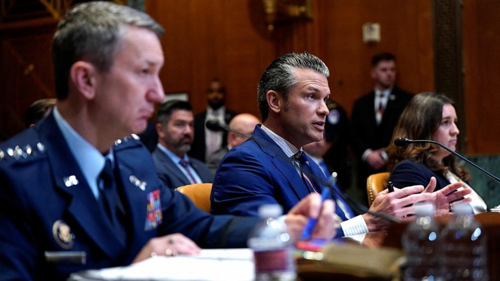 PHOTO: Defense Secretary Pete Hegseth, Joint Chiefs of Staff Chairman Air Force General John Caine and  Special Assistant to the Secretary of Defense Bryn Woollacott MacDonnell attend a Senate Appropriations Committee hearing in Washington, June 11, 2025.