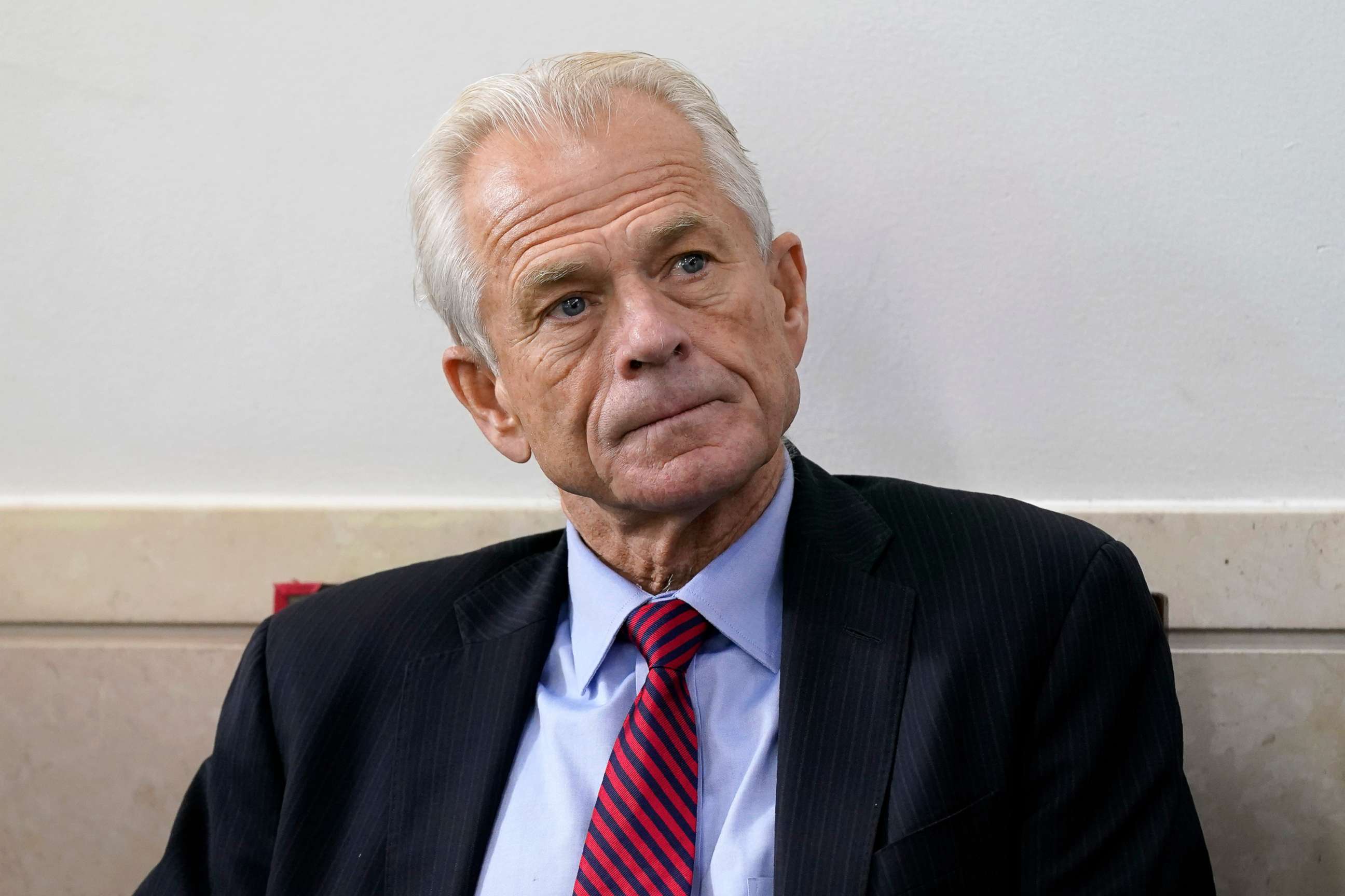 PHOTO: In this Aug. 14, 2020, file photo, White House trade adviser Peter Navarro listens as President Donald Trump speaks during a news conference at the White House, in Washington, D.C.