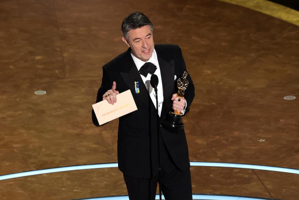 PHOTO: Peter Straughan accepts the Best Writing (Adapted Screenplay) award for "Conclave" onstage during the 97th Annual Oscars at Dolby Theatre, on March 2, 2025, in Hollywood, Calif.