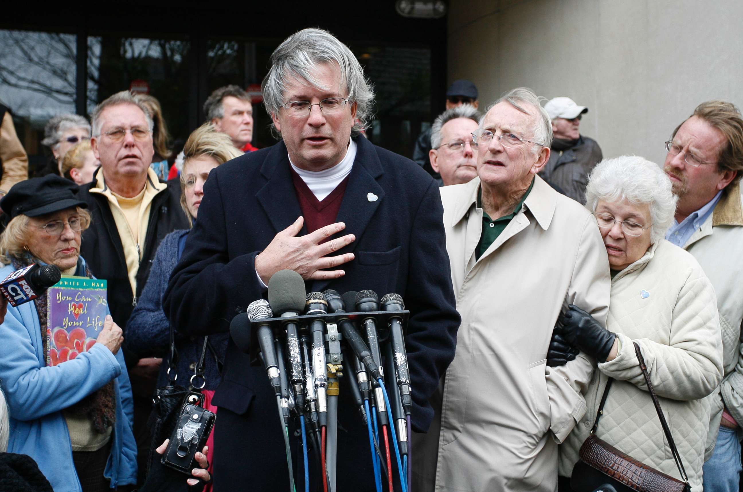 PHOTO: Dr. William A. Petit Jr., center, surrounded by members of the  the Petit and Hawke family, reacts to the sentence given to Steven Hayes, not pictured, following jury deliberations Monday, Nov. 8, 2010, at the New Haven, Conn., County Courthouse.