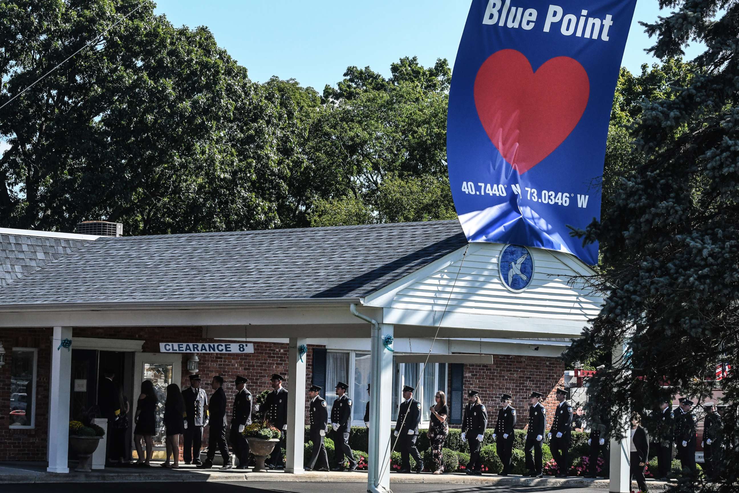 PHOTO: First responders gather at a funeral home to pay respects to Gabby Petito, Sept. 26, 2021, in Holbrook, New York.