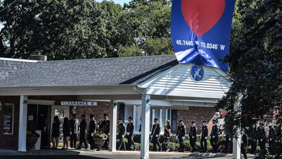 PHOTO: First responders gather at a funeral home to pay respects to Gabby Petito, Sept. 26, 2021, in Holbrook, New York.