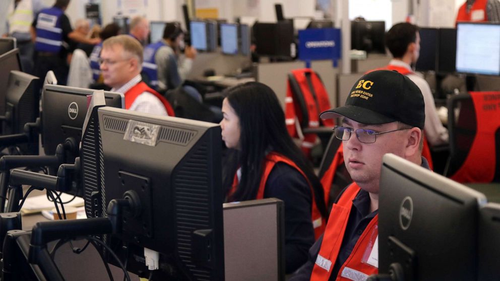 PHOTO: Pacific Gas & Electric employees work in the PG&E Emergency Operations Center in San Francisco, Oct. 10, 2019.
