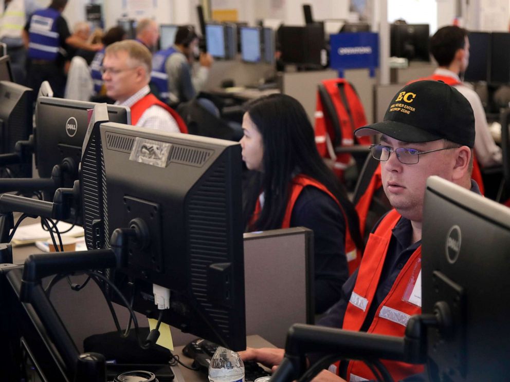 PHOTO: Pacific Gas & Electric employees work in the PG&E Emergency Operations Center in San Francisco, Oct. 10, 2019.