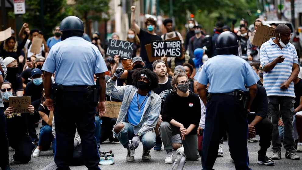 PHOTO: Demonstrators take a knee, June 2, 2020, in Philadelphia, during a protest over the death of George Floyd.