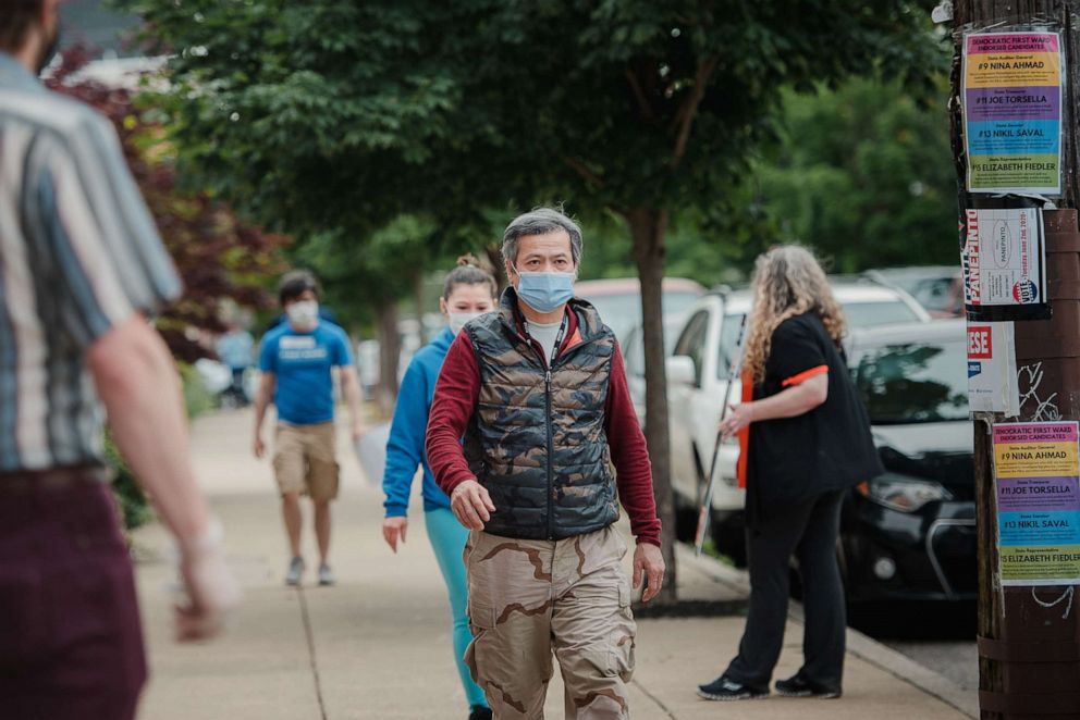 PHOTO: Voters walk to a polling station in Philadelphia,  June 2, 2020. 