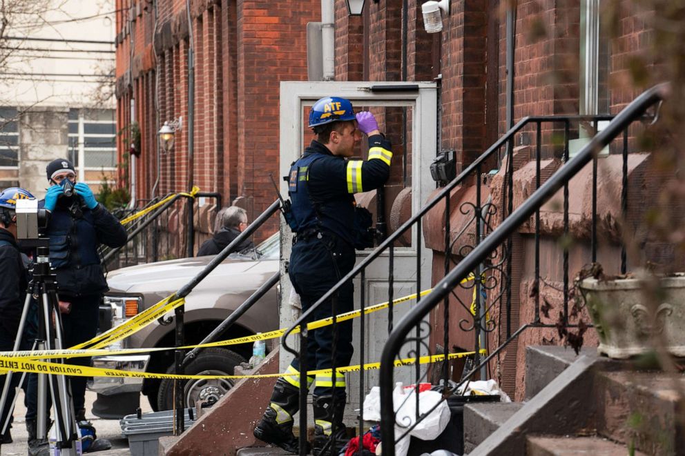 PHOTO: An Alcohol Tobacco and Firearms official removes his hat as he walks into a house in Philadelphia on Jan. 6, 2022, a day after a deadly fire took place.