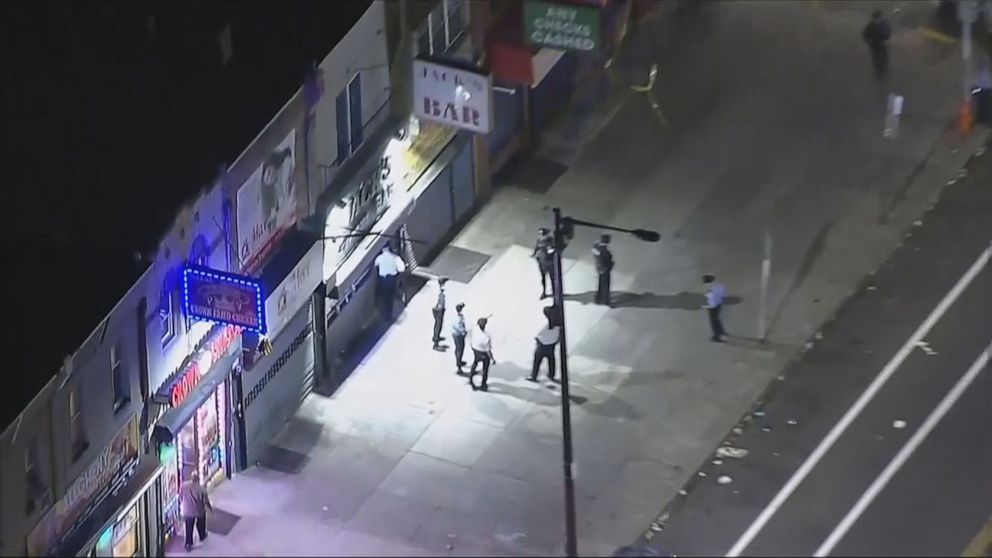  Police analyse   the intersection that was the country   of a shooting that injured 9 successful  the Kensington country  of Philadelphia, Nov.5, 2022.