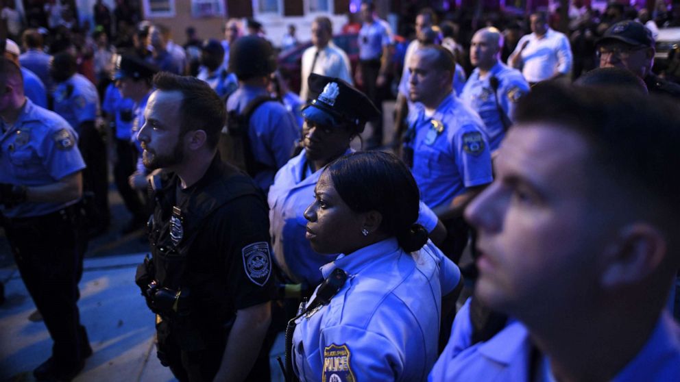 Politicians push for gun control after 6 police officers shot in ...
