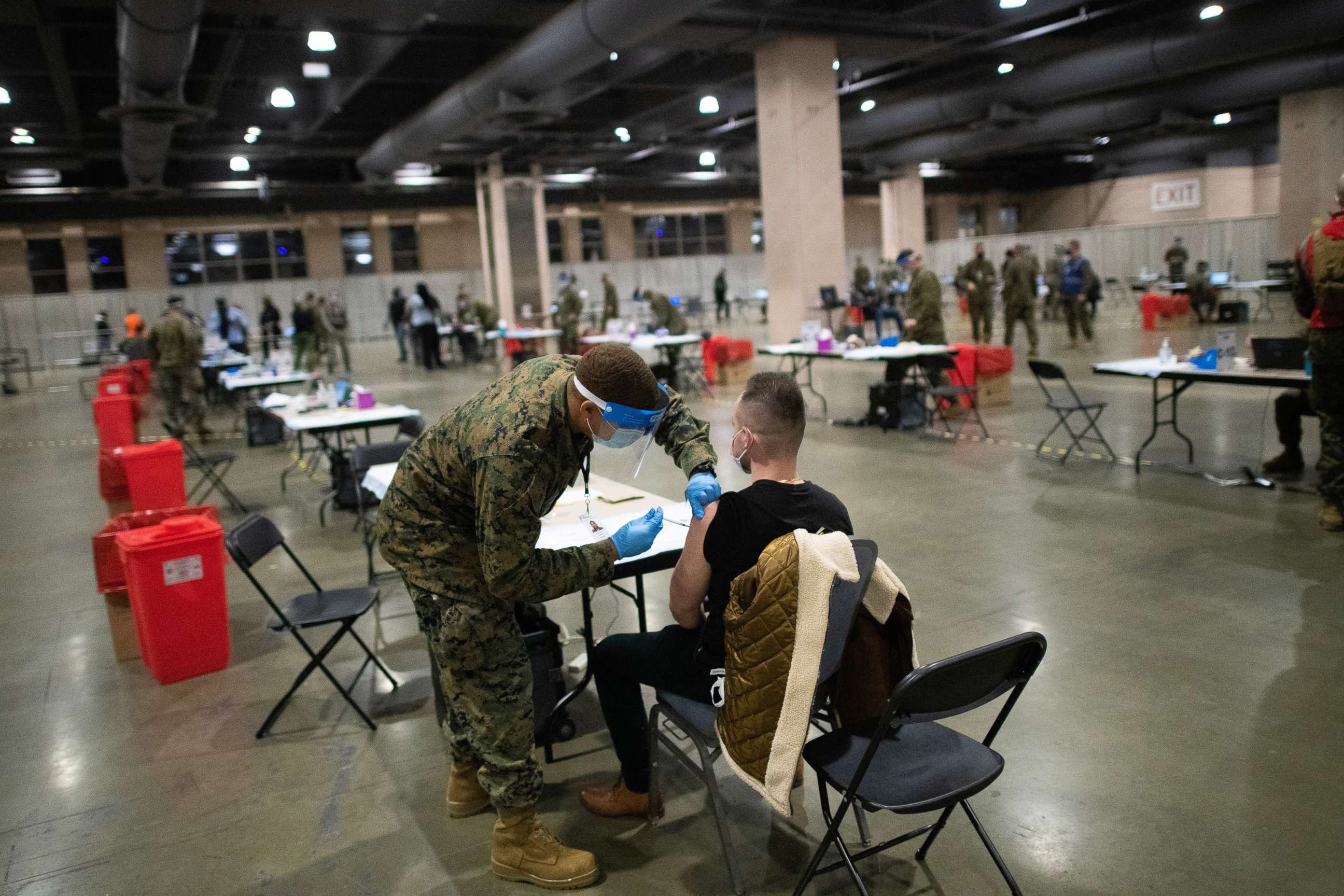 PHOTO: Military personnel administer a COVID-19 vaccine at a FEMA community vaccination center on March 2, 2021 at the Pennsylvania Convention Center in Philadelphia.