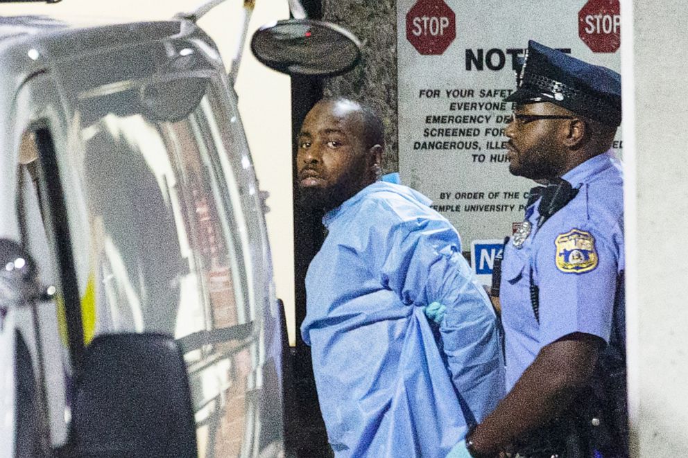 PHOTO: Police take shooting suspect, Maurice Hill, into custody after a standoff on Aug. 14, 2019 with police, that wounded several police officers, in Philadelphia.