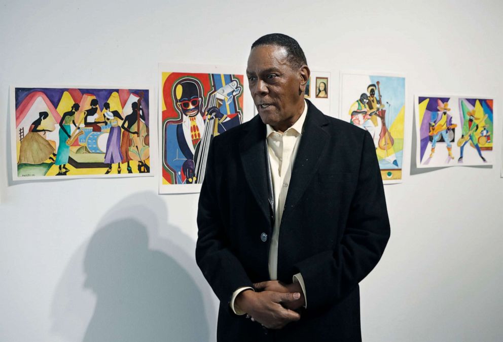 PHOTO: Richard Phillips stands next to some of his artwork during an interview at the Community Art Gallery in Ferndale, Mich., Jan. 17, 2019. Phillips was exonerated of murder in 2018 after 45 years in prison.