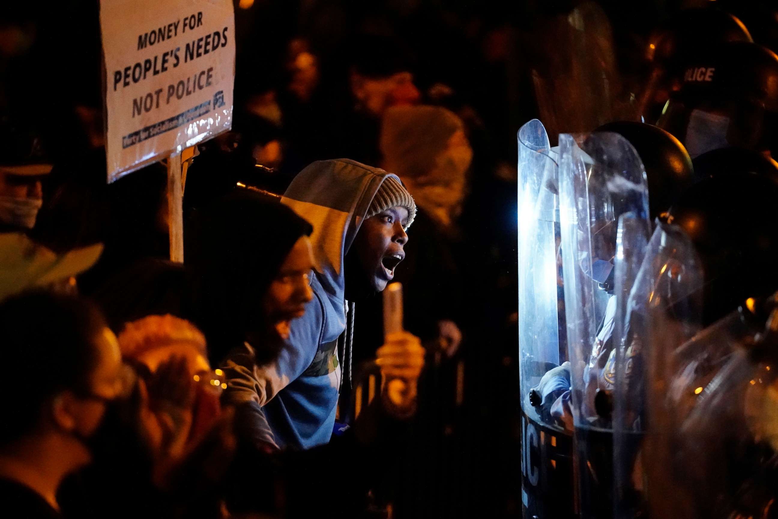 PHOTO: Protesters confront police during a march, Tuesday, Oct. 27, 2020, in Philadelphia. Hundreds of demonstrators marched in West Philadelphia over the death of Walter Wallace, a Black man who was killed by police in Philadelphia on Monday.