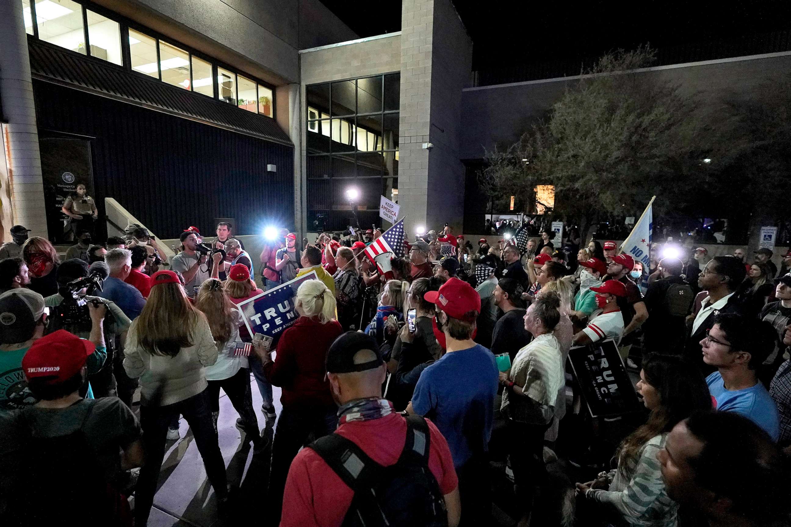 PHOTO: President Donald Trump supporters rally, Nov. 4, 2020, outside the Maricopa County Recorders Office in Phoenix.