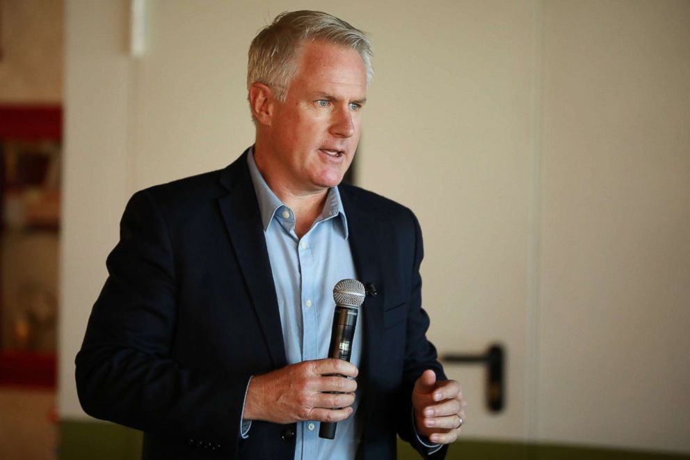 PHOTO: Photographer John Moore talks during the launch event of his "Undocumented" book on April 19, 2018 in Mexico City.