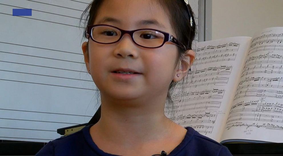 PHOTO: Sophia Suwiryo, 9, with her piano teacher Takako Frautschi, Feb. 1, 2018, in Cincinnati.