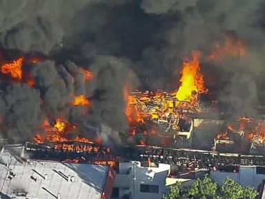 Uncontrollable apartment fire displaces 300, injures 3