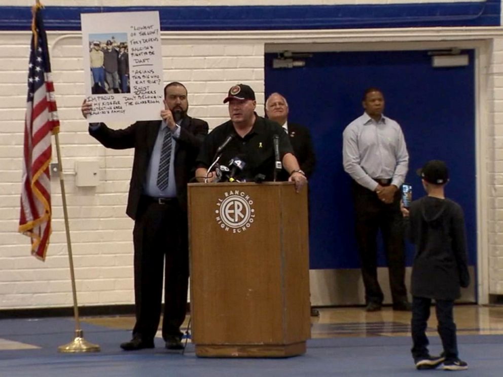 PHOTO: Members of the community hold a school board meeting, Feb. 6, 2018, calling for the firing of Gregory Salcido, a teacher who was filmed giving an anti-military rant, in Pico Rivera, Calif.