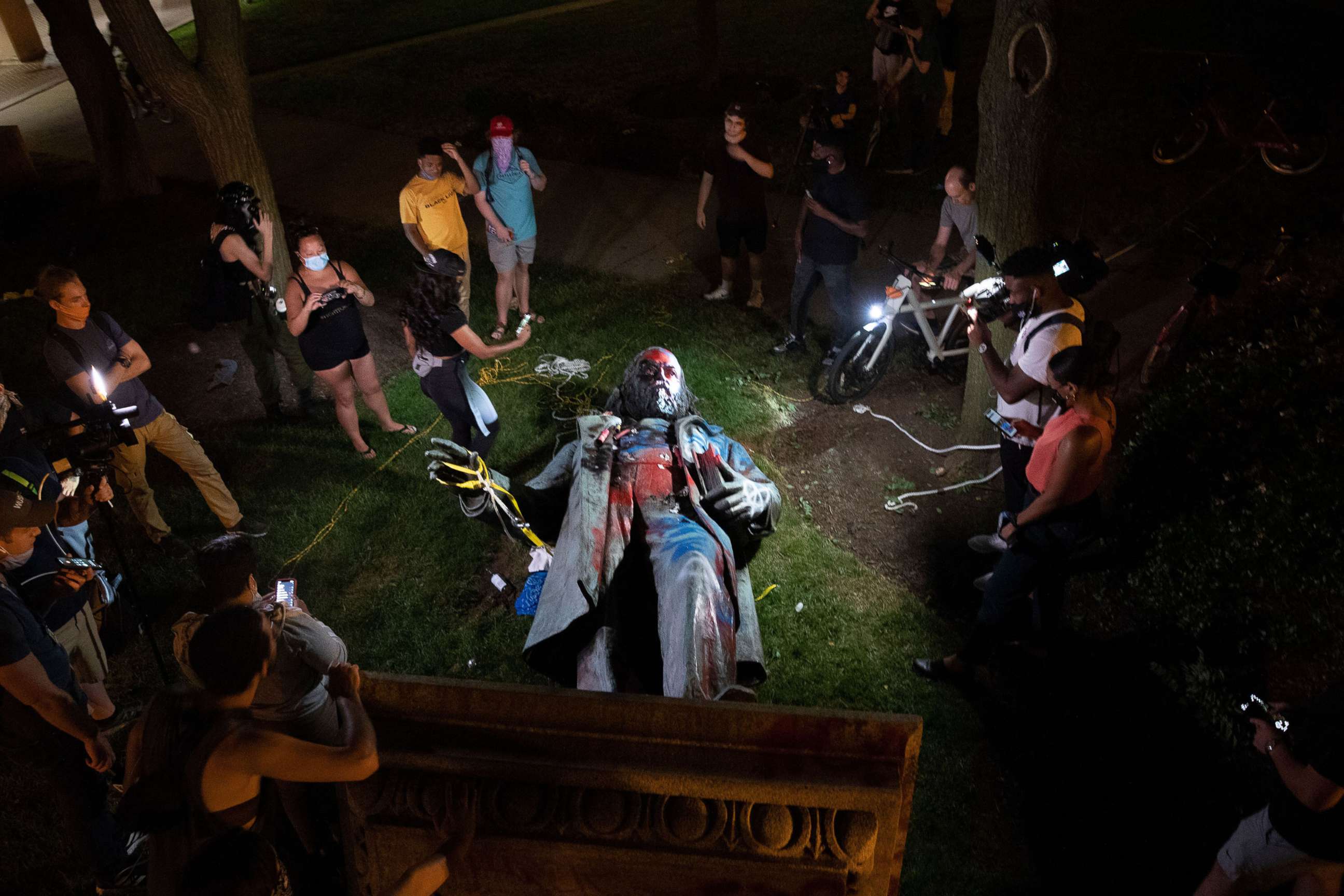 PHOTO: A statue of Confederate General Albert Pike lays on the ground after being toppled near Judiciary Square following a day of Juneteenth celebrations in Washington, DC, June 20, 2020.