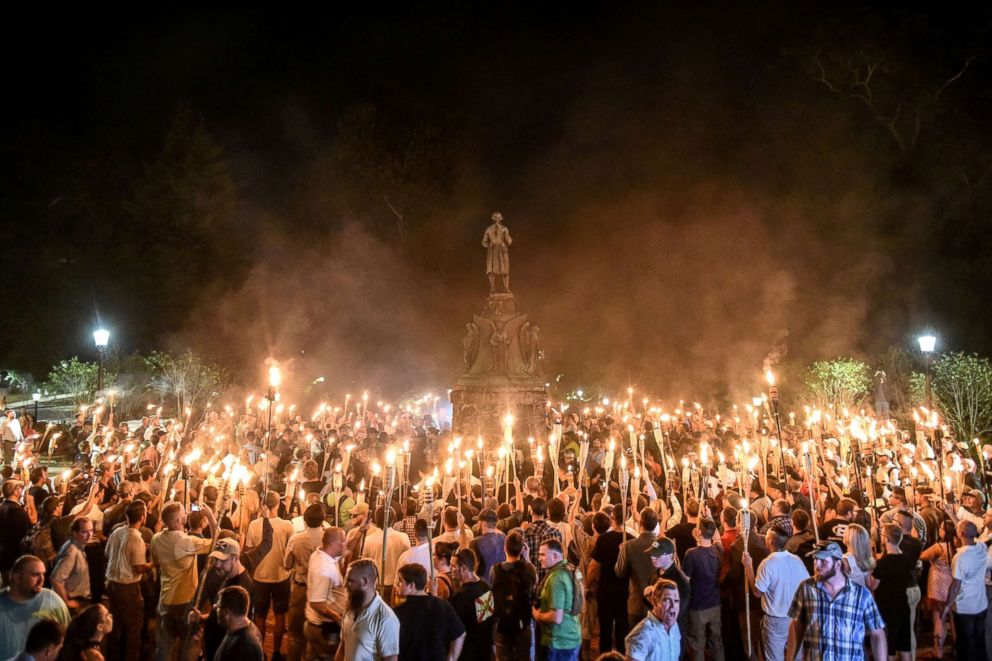PHOTO: White nationalists participate in a torch-lit march on the grounds of the University of Virginia ahead of the Unite the Right Rally in Charlottesville, Va., Aug. 11, 2017.